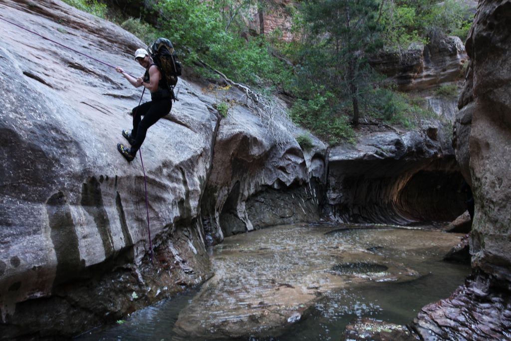 Dale rappelling into the subway.